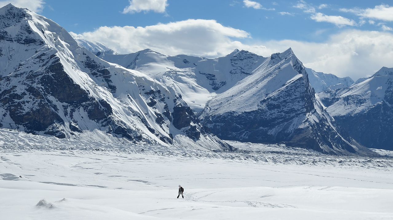 20130808-065-BaseCamp.jpg - Focus on Pesni Abeda; at its foot on the black morain is the Dikki camp