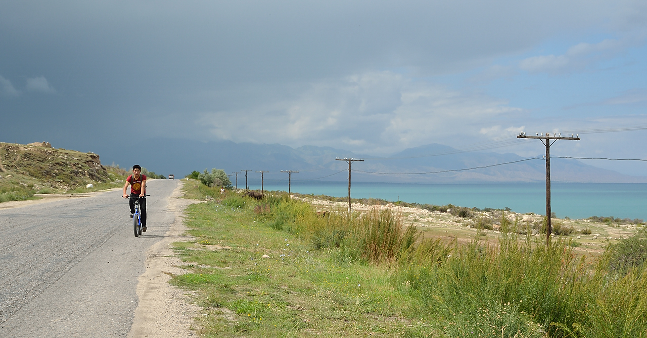 20130814-076IssykKul.jpg - A local cyclist between Jenish and AkTerek